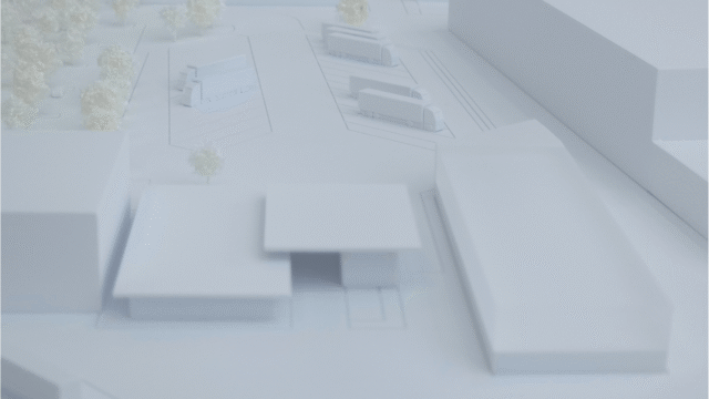 Perspektive über Bestandsgebäude auf die Baukörper der Werkserweiterung.