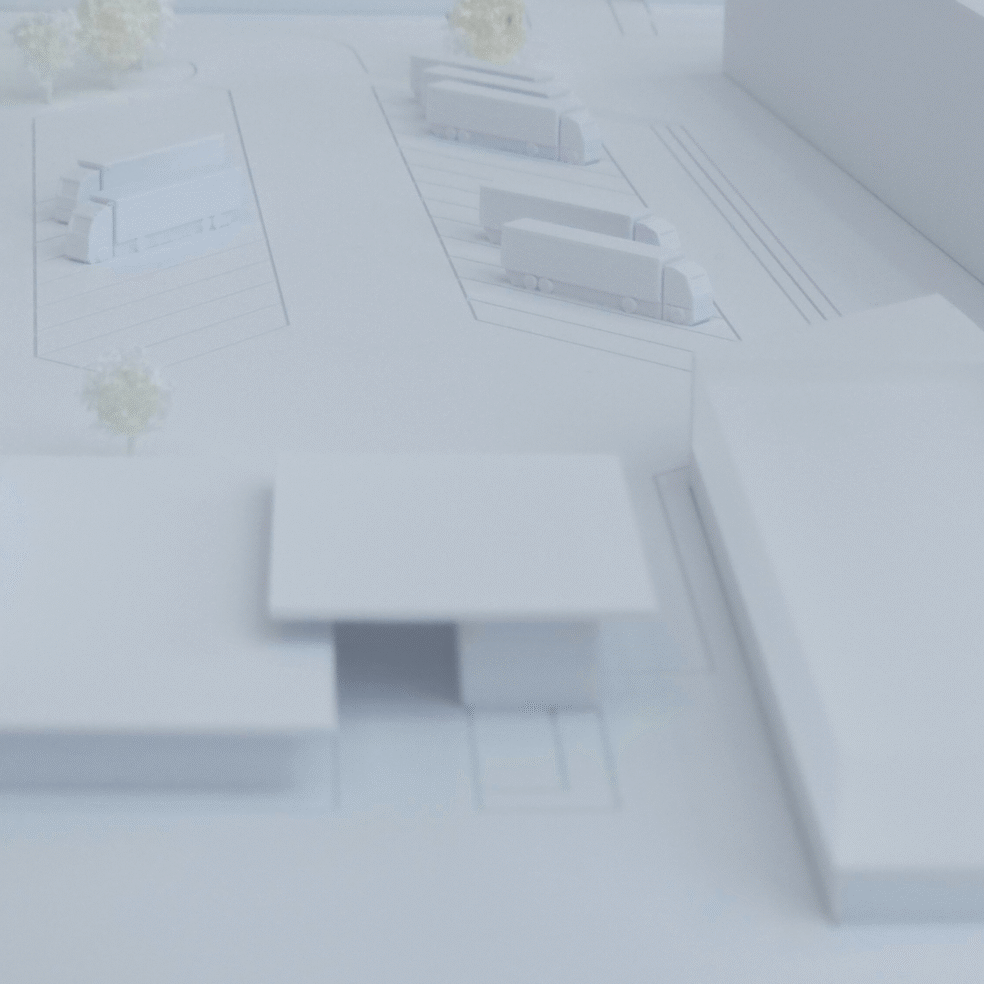 Perspektive über Bestandsgebäude auf die Baukörper der Werkserweiterung.